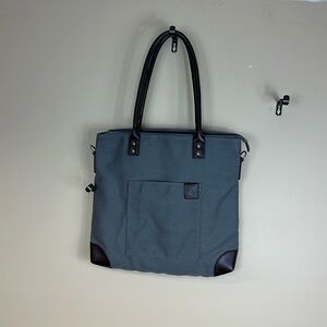 Relativity tote bag nwot 16”wide 14-1/2 length  zip closure outside pocket